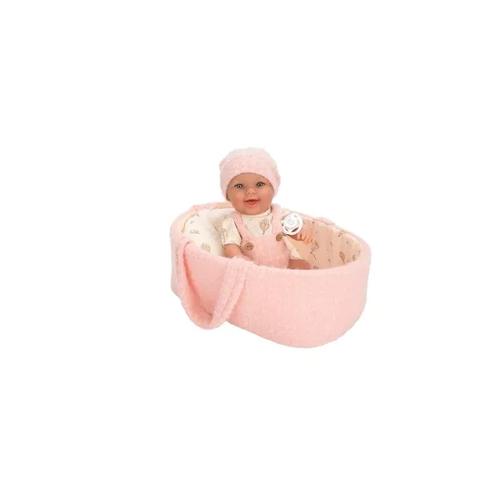 Poupée Arias dans un panier de transport