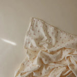 Mushie Swaddle - 120x120cm - Strikjes